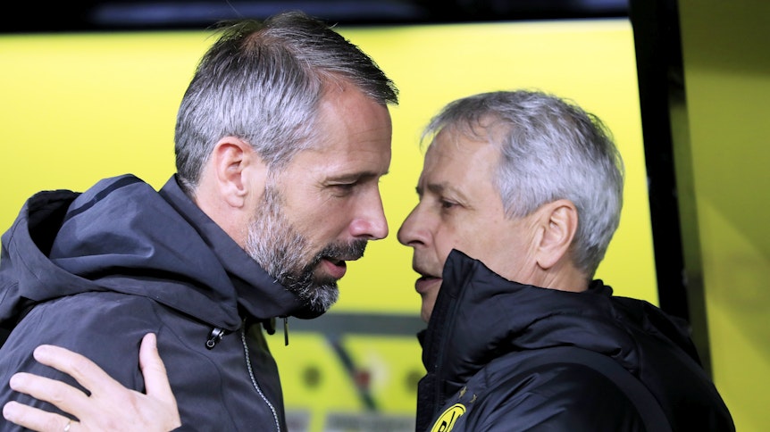 Die Trainer Marco Rose (l.) und Lucien Favre (r.) unterhalten sich im Oktober 2019 beim Duell zwischen Dortmund und Gladbach.
