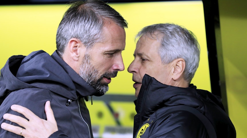 Gladbachs Trainer Marco Rose (l.) und seine Kollege Lucien Favre (r.) im Gespräch an der Seitenlinie im Dortmunder Stadion im Oktober 2019.