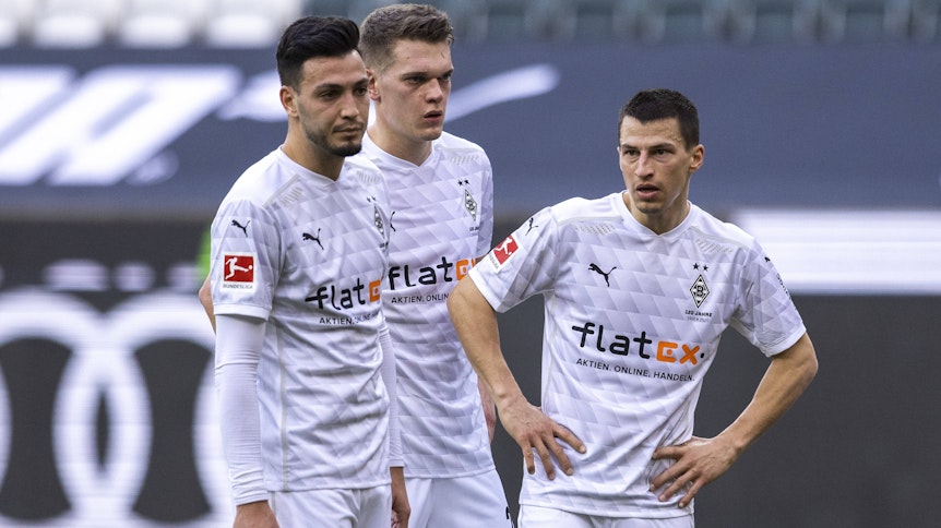 Ramy Bensebaini (l.), Matthias Ginter (Mitte) und Stefan Lainer von Borussia Mönchengladbach beim Spiel gegen den FSV Mainz am 20.Februar.2021 im Borussia-Park.