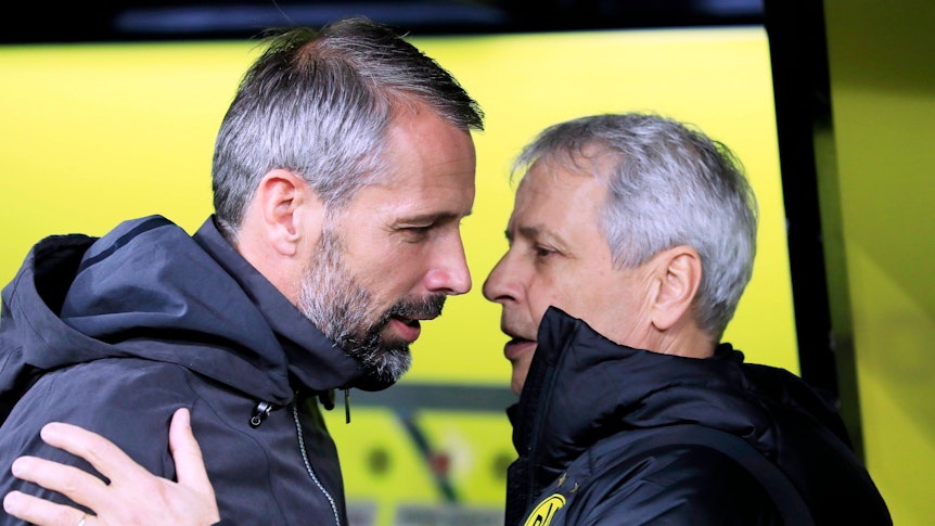 Marco Rose (li.) und Lucien Favre (re.) begrüßen sich am 19. Oktober 2019 vor einem Bundesligaspiel in Dortmund.