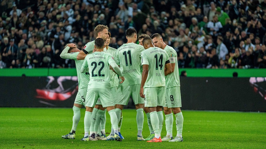 Spieler von Borussia Mönchengladbach jubeln.