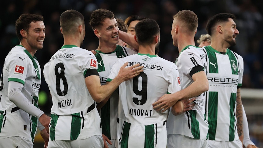 Profis von Borussia Mönchengladbach jubeln.