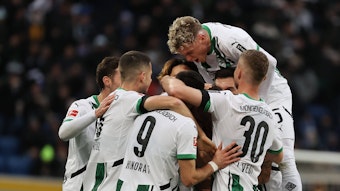 Gladbach-Spieler jubeln.
