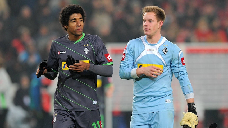 Dante und Marc-André ter Stegen im Gladbach-Trikot auf dem Platz.