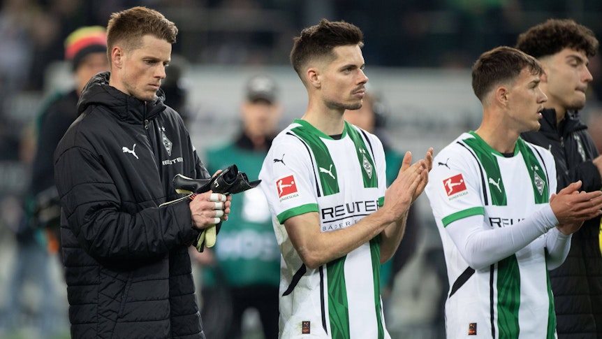 Profis von Borussia Mönchengladbach bei den Fans.