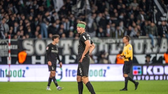 Marvin Friedrich mit einer grünen Kopfbandage.